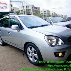 kia-carens-2009